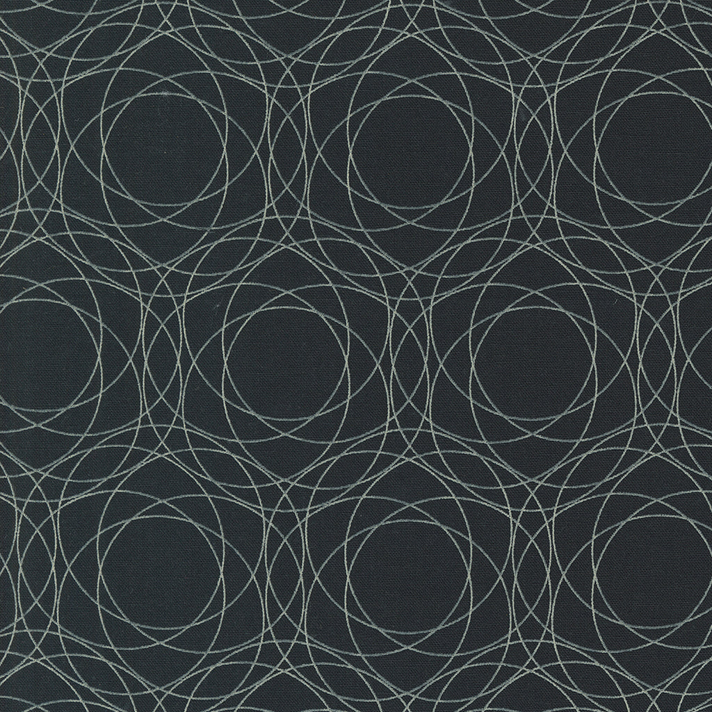Shimmer by Zen Chic for Moda. Ebony- Geometric Medium Gray Circles on a Soft Black Background.