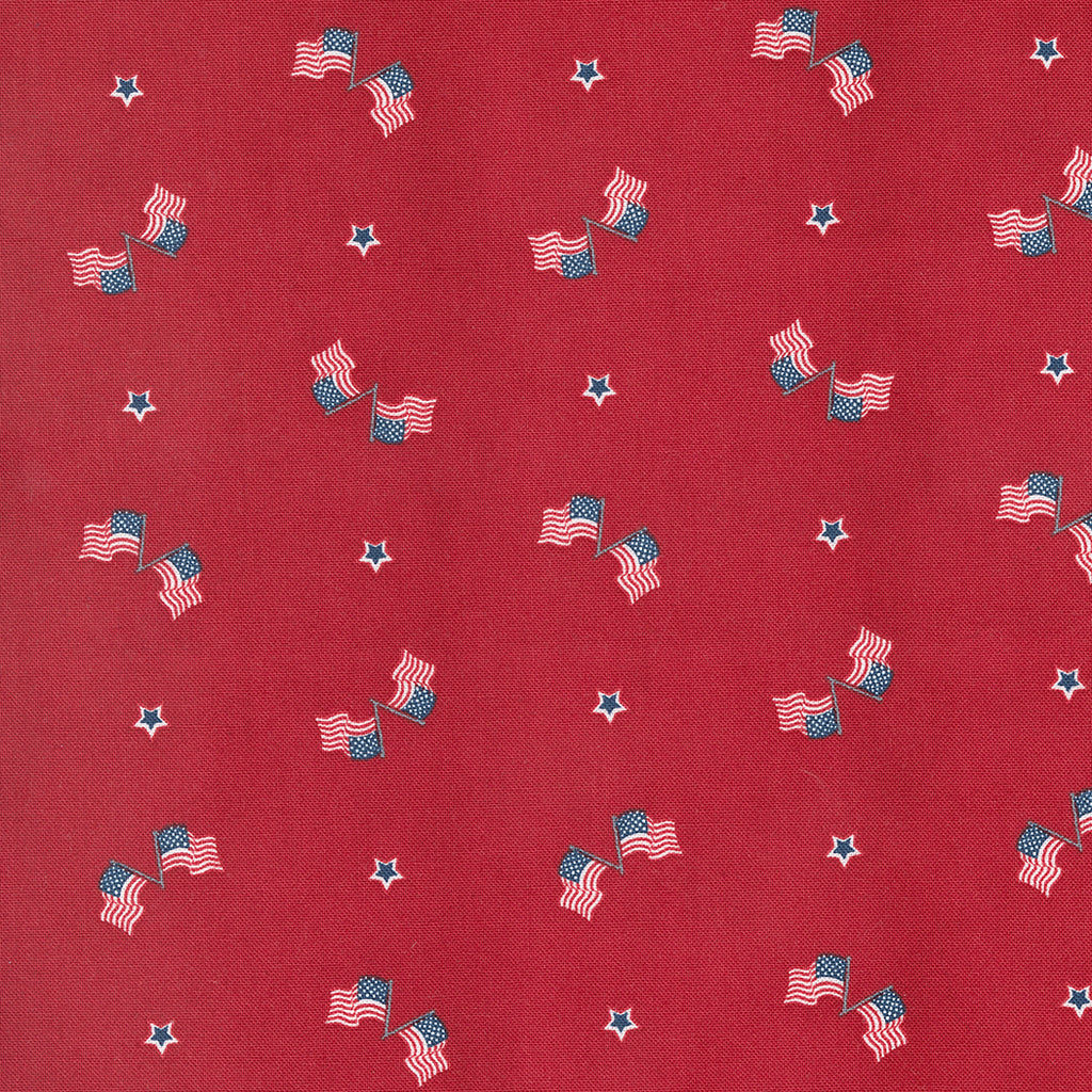 Small American Flags and Scattered White and Blue Stars on a Red Background. Fabric