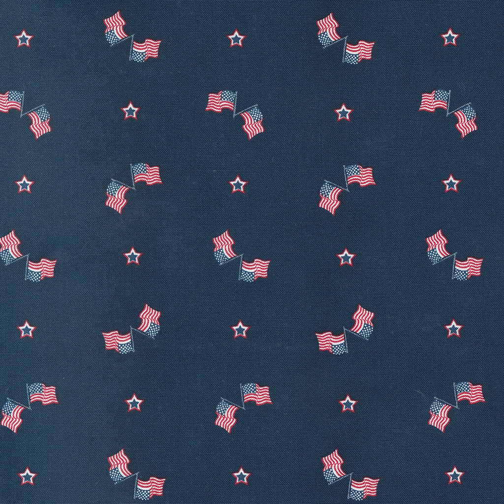 Small American Flags and Scattered Red, White, and Blue Stars on a Blue Background. Fabric
