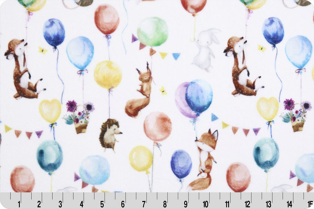 Various animals, including a fox, deer, rabbit, and hedgehog floating upward by holding onto blue, yellow, red, and green balloons. Cuddle fabric
