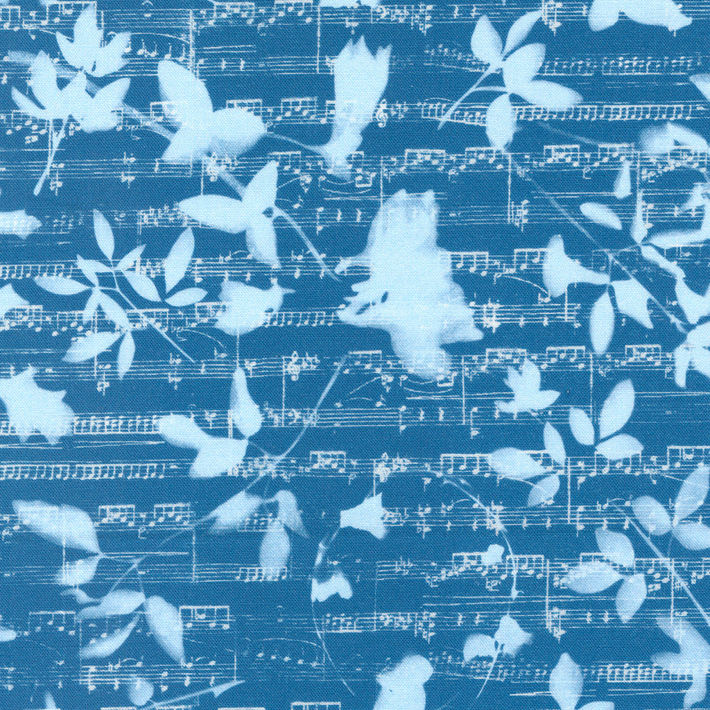 Light Blue Leaves and Florals overlaid on Light Blue Sheet Music and a Cyan Medium Blue Background. Fabric