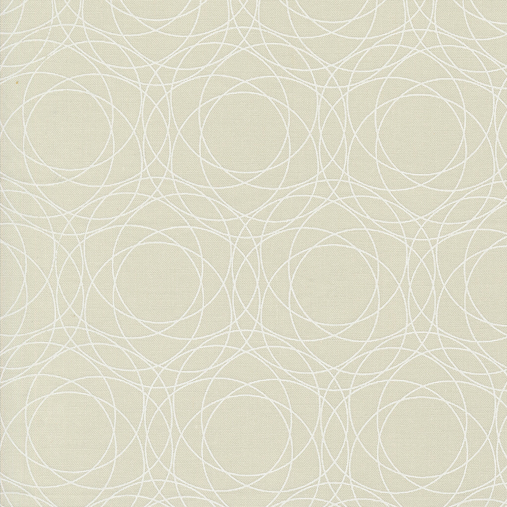 Shimmer by Zen Chic for Moda. Ecru- Geometric White Circles on a Light Tan Background.