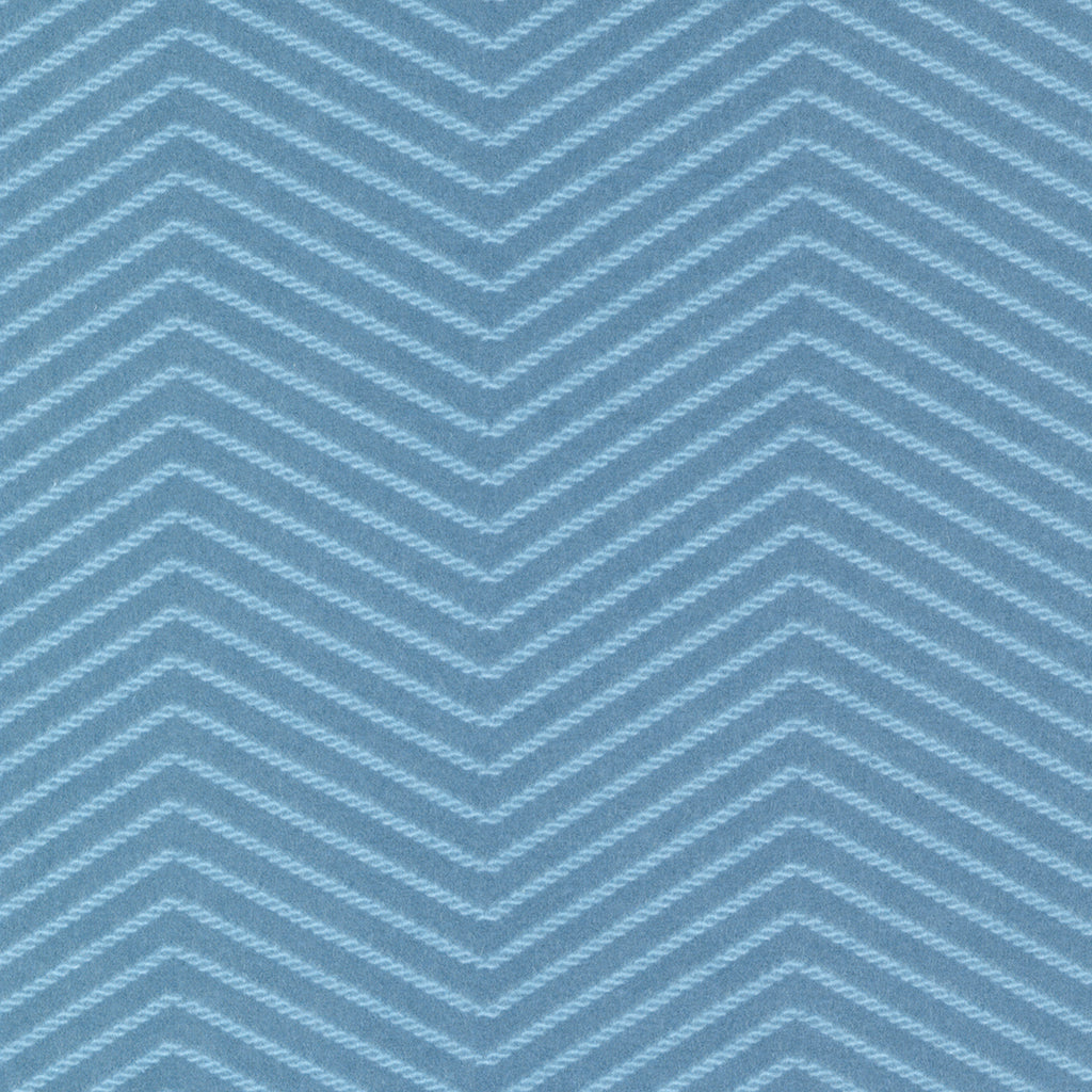 Medium blue flannel fabric with a zig zag design done in light blue.