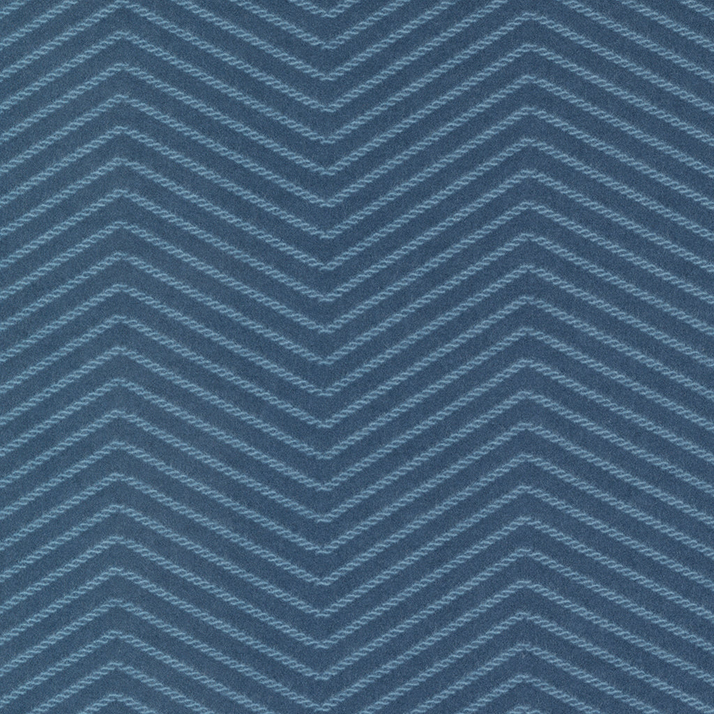 Dark blue flannel fabric with a zig zag design done in a medium blue.