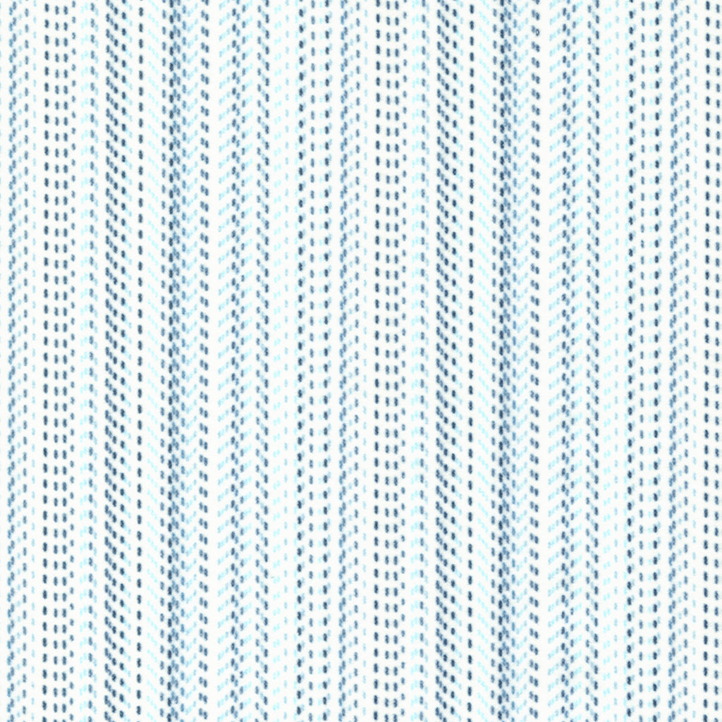 White flannel fabric with dotted stripes done in light, medium, and dark blue.