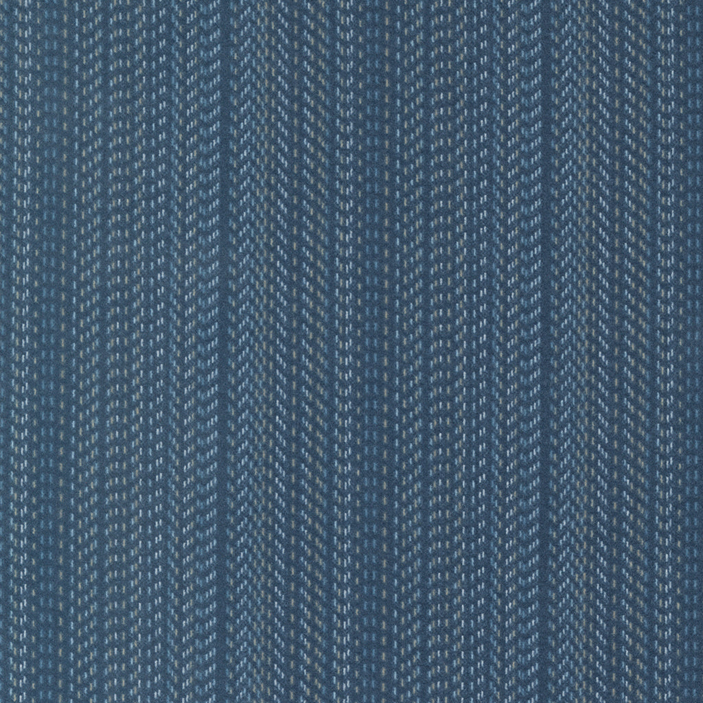 Dark blue flannel fabric with a variety of blue and cream stripes.