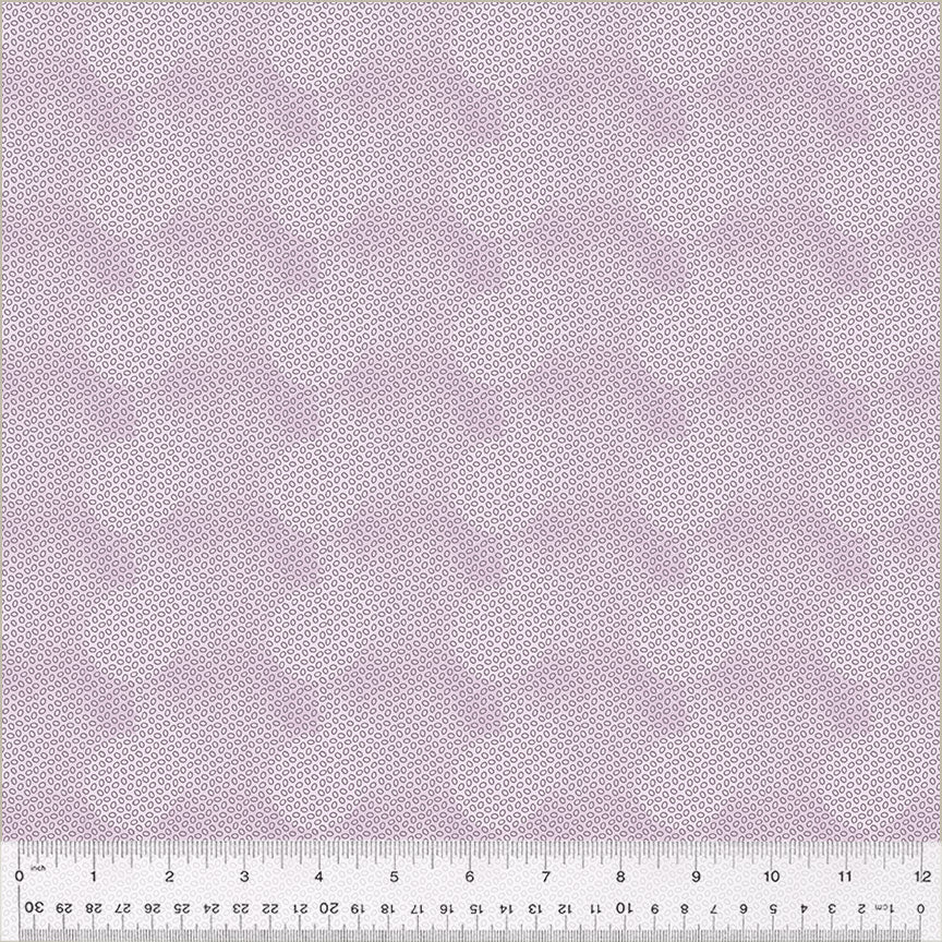 Circa: Purple by Whistler Studio for Windham Fabrics. Ditty Dot - Light Purple Circles on a Blurred Light Purple Background. Pattern creates a Secondary Pattern of Dots.