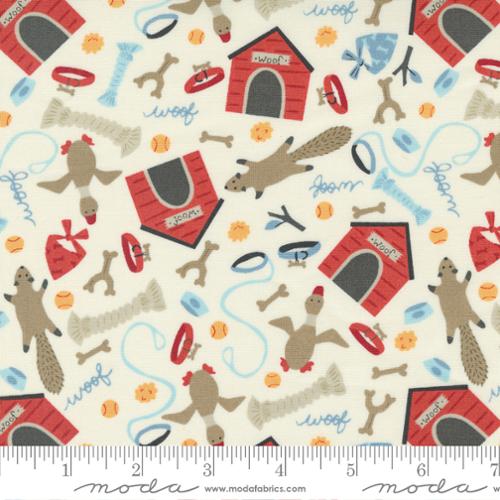 Allover print of various dog toys, dog houses, leashes, collars, and the word "Woof" on a cream background. Fabric