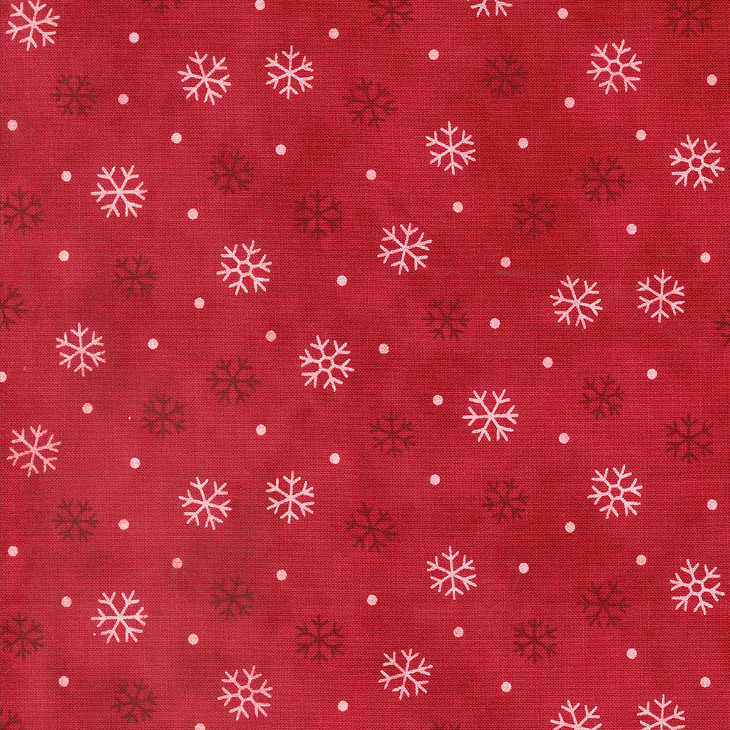 Woodland Winter by Deb Strain for Moda. Cardinal Red- A Scattered Snowflake Pattern with White Dots on a Red Background. 