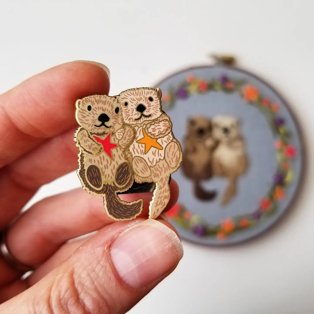 Sea Otters Enamel Needle Minder by Jessica Long Embroidery.