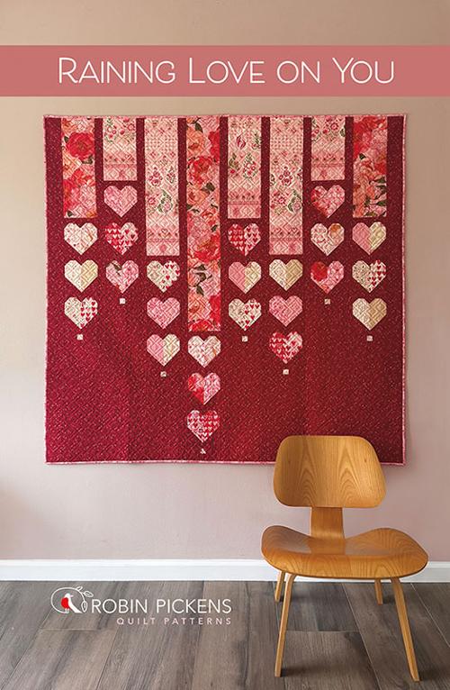 Raining Love On You pattern by Robin Pickens of Robin Pickens Inc. Finished Sizes: 65 inch x 65 inch and; 32 inch x 12 inch Pillow