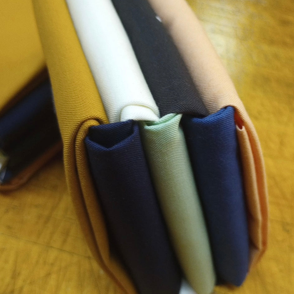 Fat Quarter Bundle of 7 Bella Solids to coordinate with the Brookside line of fabric designed by 1Canoe2 for Moda. 