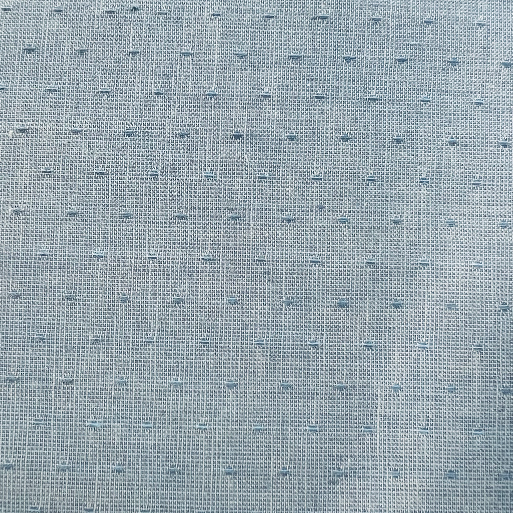 Nikko Earth by Diamond Textiles. Light Blue Doted Woven