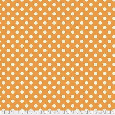 White dots on a tangerine orange background. Fabric