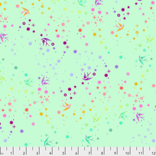Mint green background with rainbow polka dots, stars, and birds on top. Fabric