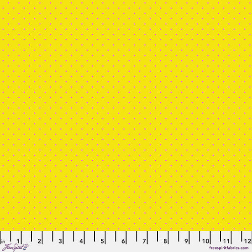 Bright lemon yellow with tiny magenta pink dots. Fabric