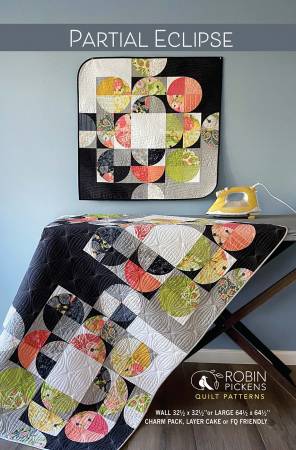 Partial Eclipse pattern by Robin Pickens of Robin Pickens Inc. Pattern makes a 32 1/2" x 32 1/2" wall hanging or a 64 1/2" x 64 1/2" large lap quilt.