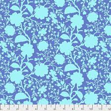 A bluish lavender purple with a bright teal floral on top. Fabric 
