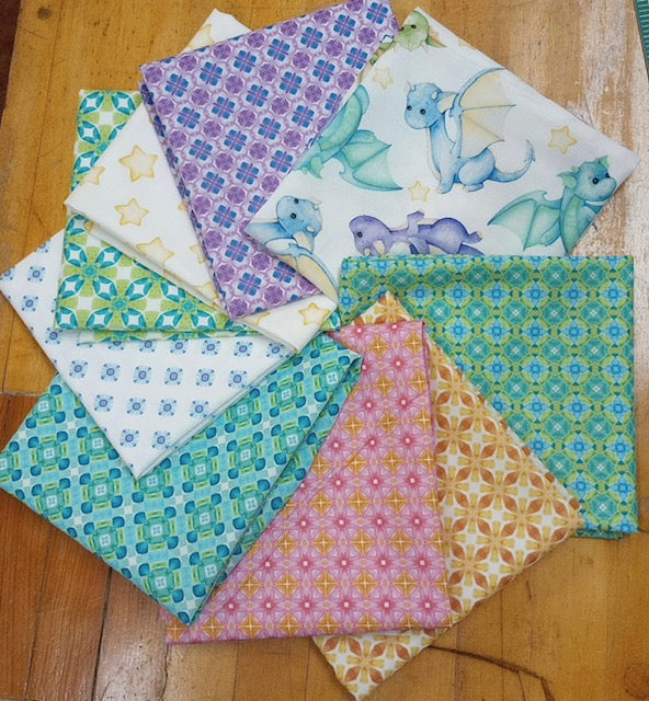 Fat Quarter Bundle of 9 fabrics from the Dragon Friends designed by Jason Yenter of In The Beginning Fabrics!
